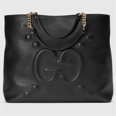 gucci canvas tote with leather handles|Gucci embossed leather tote bag.